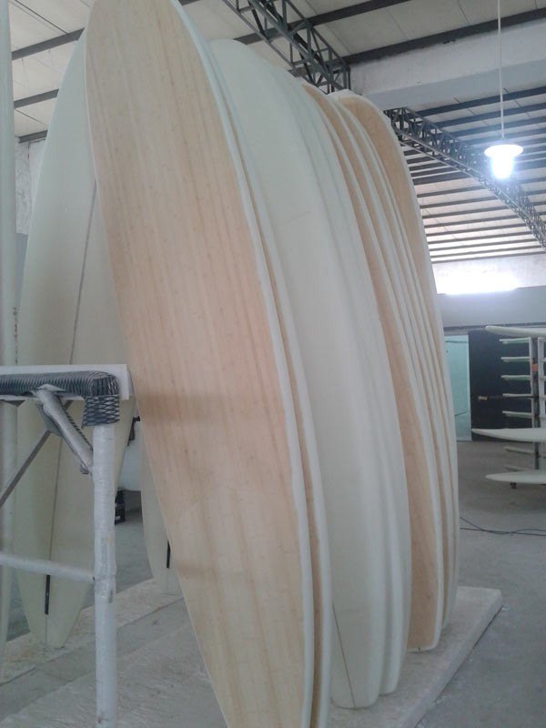 Surfboard blanks lined up in the factory