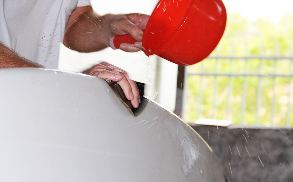 Phil Grace working on a surfboard